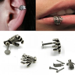 Body piercing with skull handEarrings