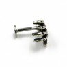 Body piercing with skull handEarrings