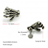 Body piercing with skull handEarrings