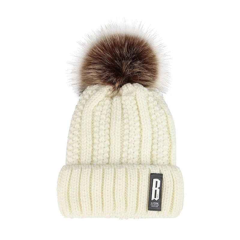 Warm winter wool hat with pom pomHats & Caps