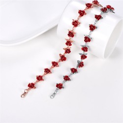 Gold & silver bracelet with red rosesBracelets