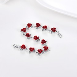 Gold & silver bracelet with red rosesBracelets